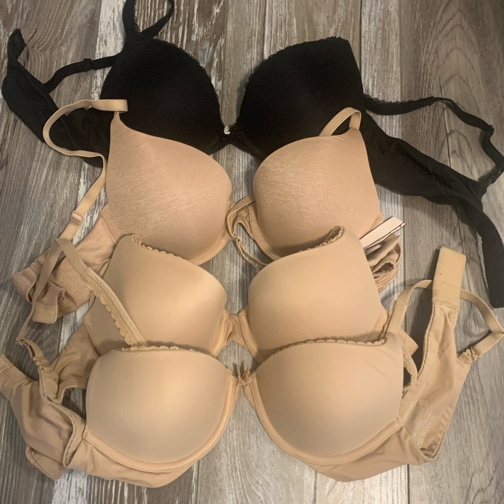 4 Victoria secret bras. 3 NWOT, one wore 3 times. 34B push up + perfect shape